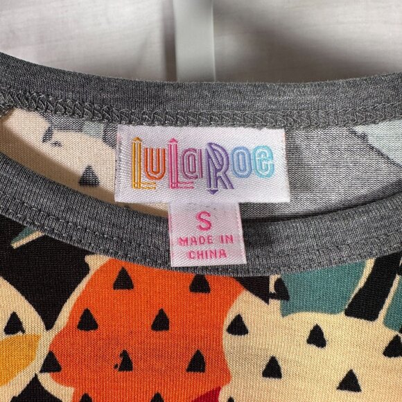 LuLaRoe RANDY Black Gran Floral Hibiscus Flower Yellow Raglan Tee Shirt SMALL S - Picture 2 of 6